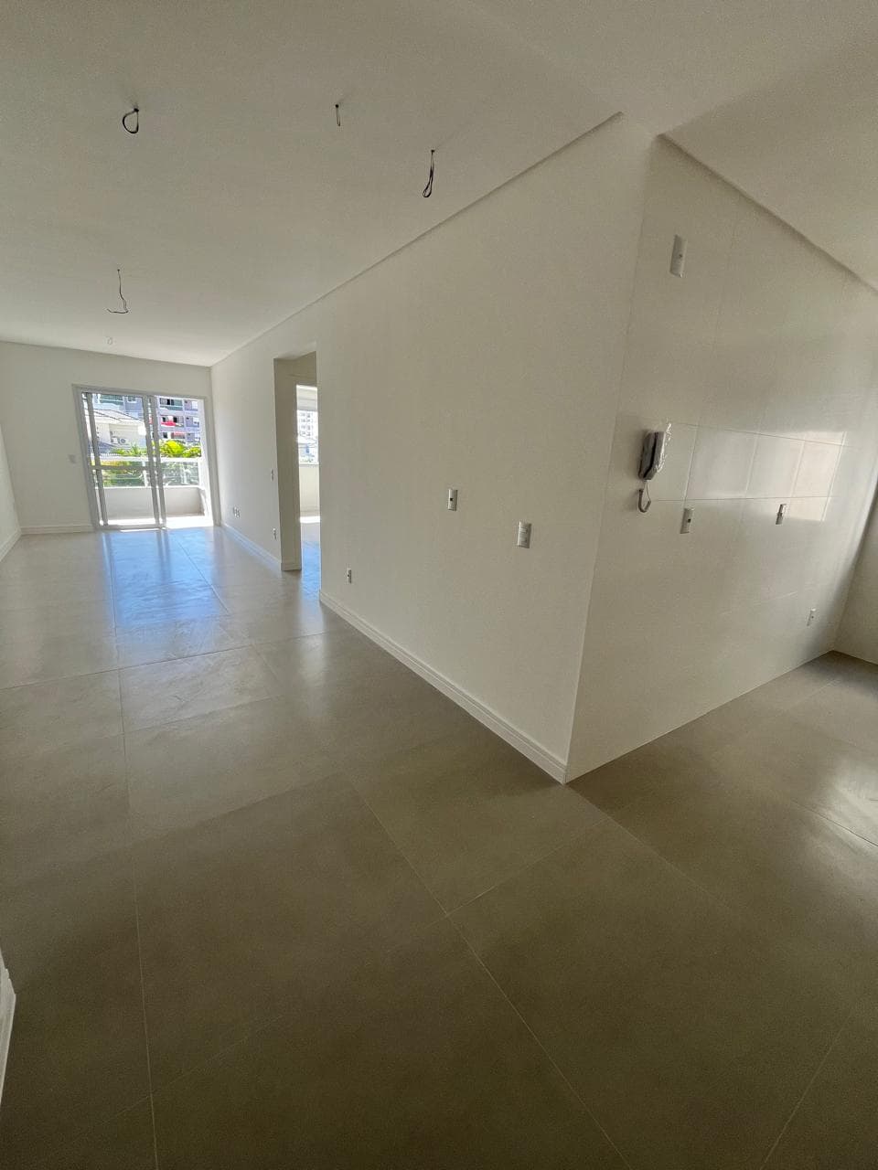 Sala de estar integrada à varanda